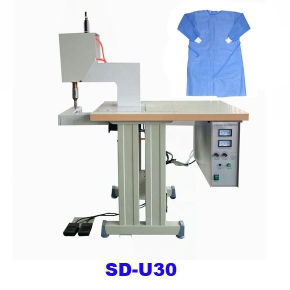 ultrasonic sleeve sewing machine for surgical gown sleeve sealing
